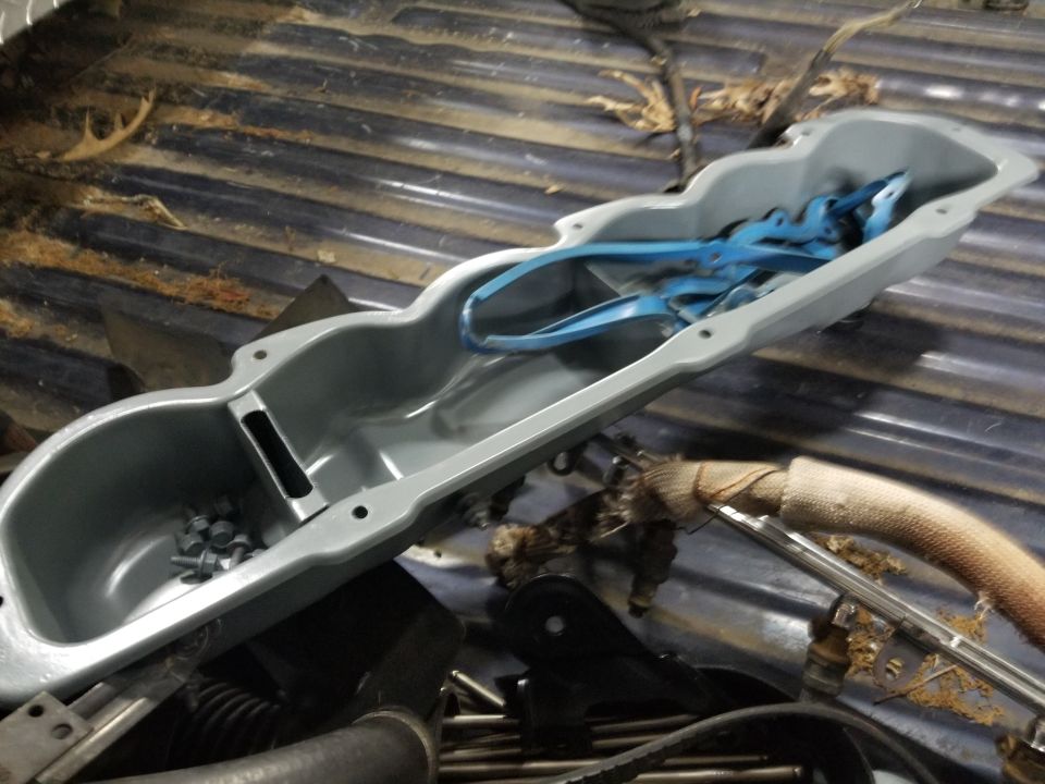The valve cover got solvent-washed, sandblasted, & painted. The injector rail got steel-wooled and clearcoated.