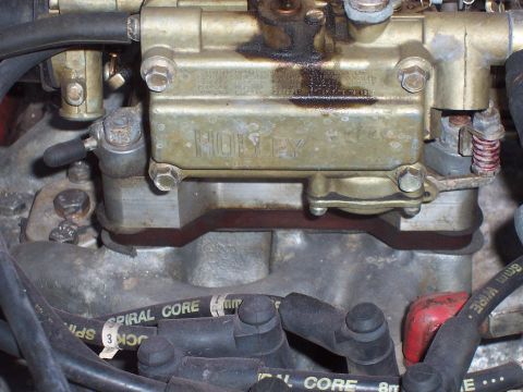 1979 Ford Bronco - This photo shows a Holley carburetor and spark plug wires, not a 1979 Ford Bronco.