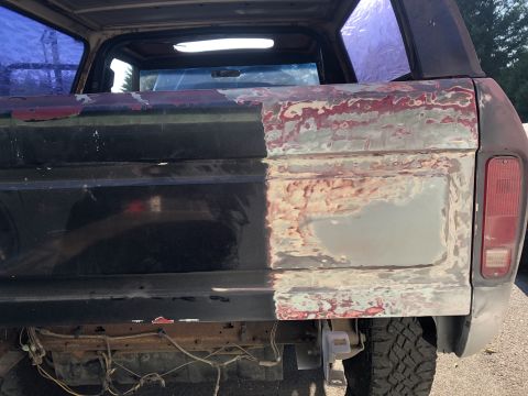 1978 Ford Bronco - The rear of a 1978 Ford Bronco shows repair work on the passenger side.
