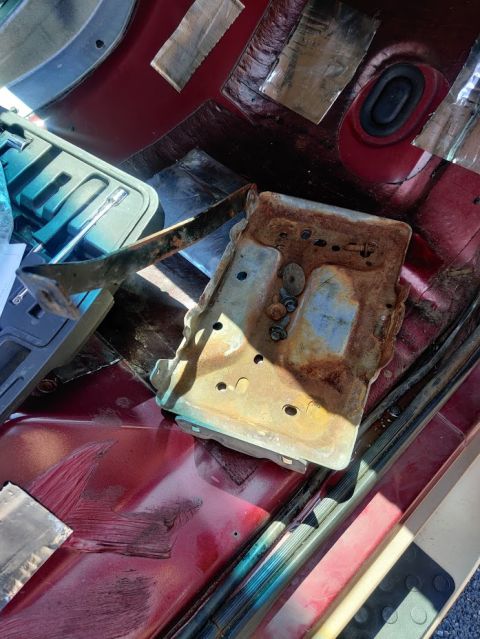 1996 Ford Bronco - 20200805 - Factory battery tray removed. Need to reuse the bolts in the bottom of the tray and mounting the side of the tray to the fender.