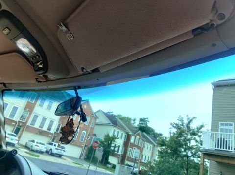 1996 Ford Bronco - 20200815 - Reinstalled the front trim at the top of the windshield. I put a bit of HMF on the back to help with rattles and noise.