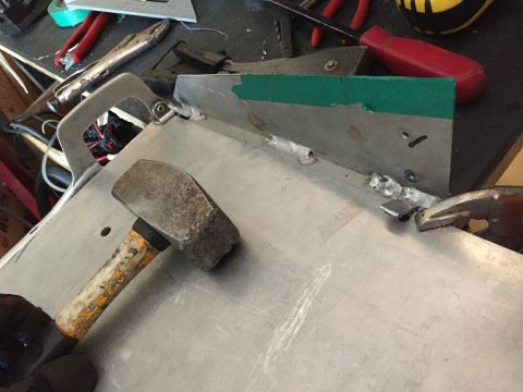 1993 Mercury Tracer - Tools are used for metal fabrication, possibly for a custom build or repair.