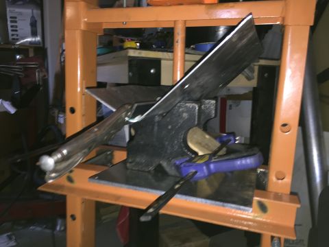 1993 Mercury Tracer - Metal fabrication equipment is shown in a workshop setting.