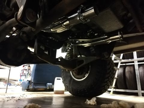 1996 Ford Bronco - A new exhaust system has been installed on the vehicle, with the underside and suspension clearly visible.