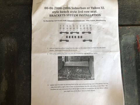 1980 Ford Bronco - Printed bracket-system installation instructions with hardware diagram and numbered steps for a Suburban/Yukon XL 3rd-row bench seat.