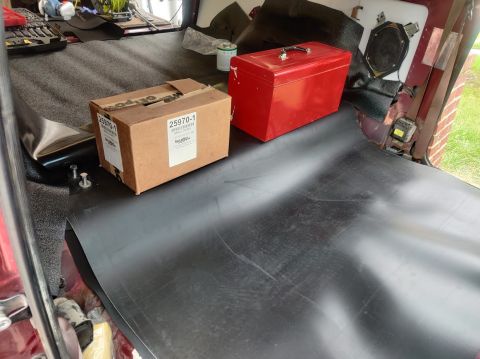 1996 Ford Bronco - 20200821 - Needed heavy boxes to keep the MLV down on the bit that attached the cargo area to the cabin area while the vinyl cement set.