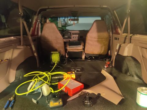 1996 Ford Bronco - 20200822 - Preview of my struggles getting the F250 reupholstered 40/20/40 seats and seatbelts in. I gave up for the night to finish it in…
