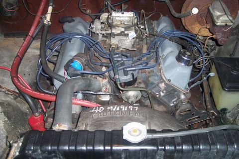 1978 Ford Bronco - Close-up view of a V8 engine, showing various components and wiring.