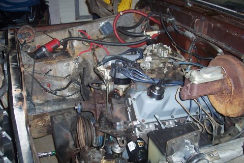 1978 Ford Bronco - Close-up view of an engine bay, showing various mechanical components and wiring.