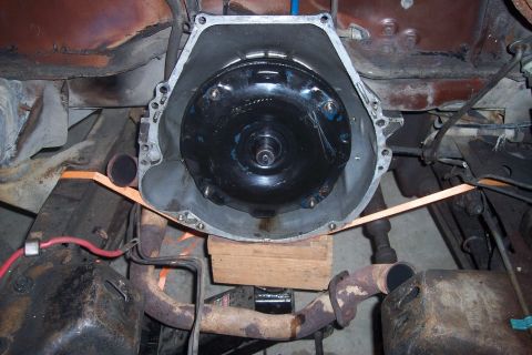 1978 Ford Bronco - Transmission bell housing and torque converter assembly, viewed from the front.