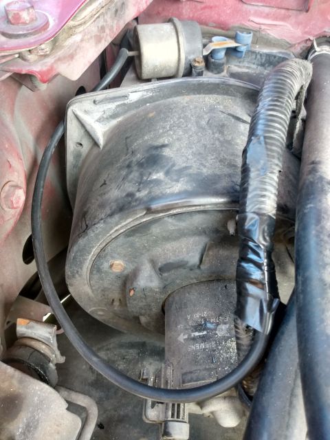 1994 Ford Bronco - Close-up of a brake booster assembly, part number F47H-2B473-A is visible.