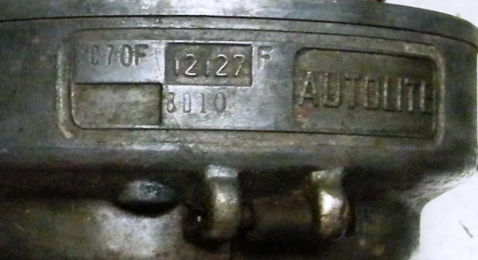 Close-up of Autolite distributor housing stamped C7OF 12127 F and 8010