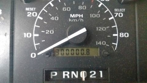 1994 Ford Bronco - The odometer reads 300,000 miles, indicating significant use of the vehicle.