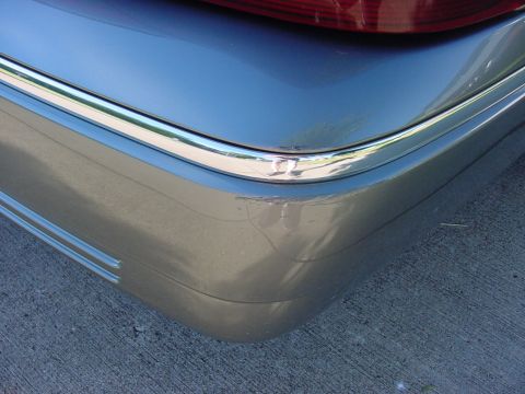 2003 Mercury Grand Marquis - Just found this today 8/30/20 while waxing the car. It must have happened in a parking lot some time.