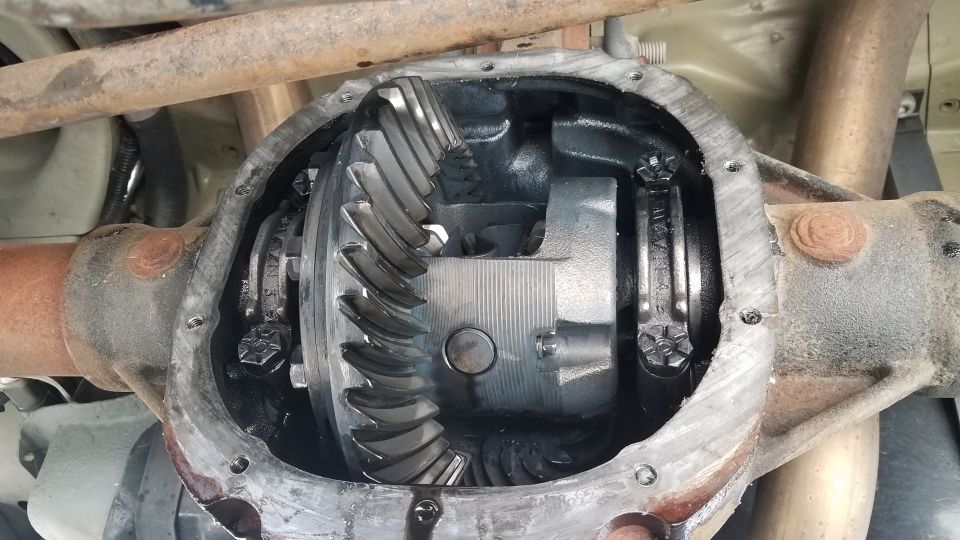 differential housing opened to show ring and pinion gears