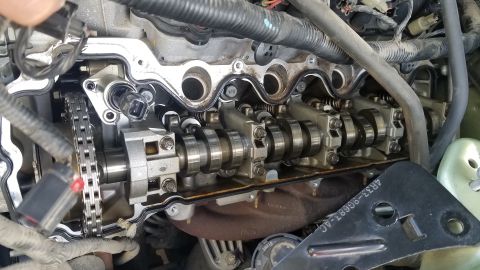 2005 Ford Mustang - Close-up of an engine's internal components after valve cover removal.
