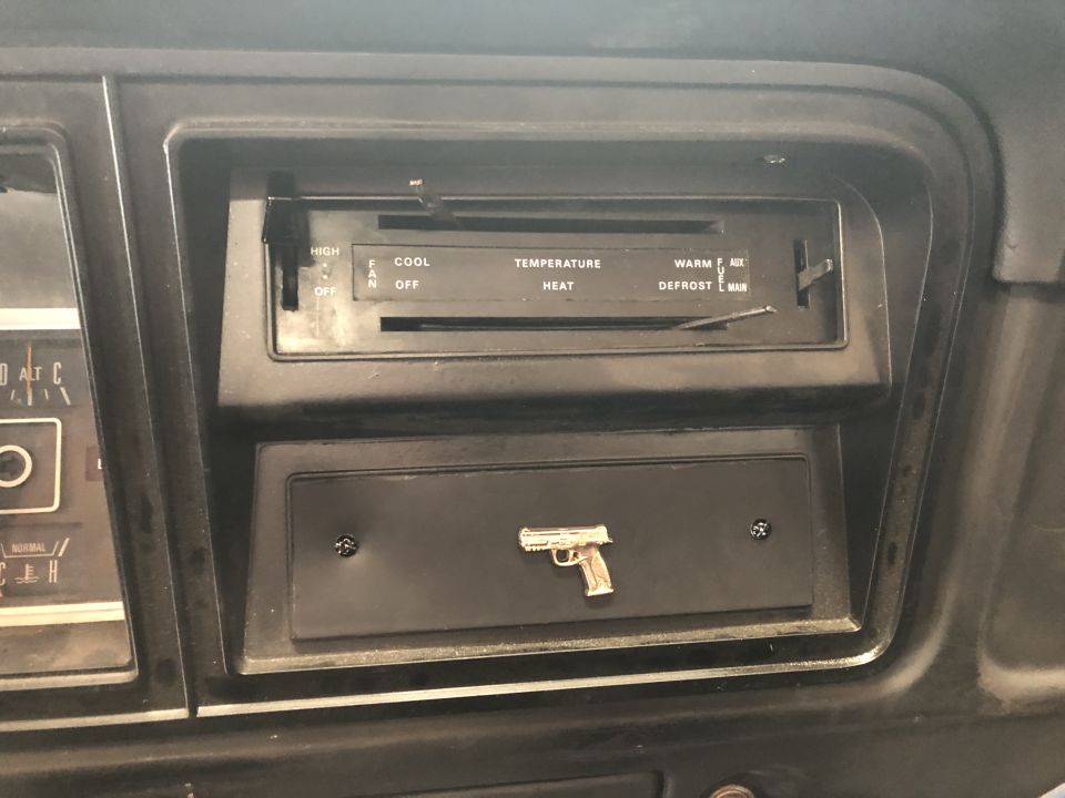 No radio, added custom plastic to cover the hole