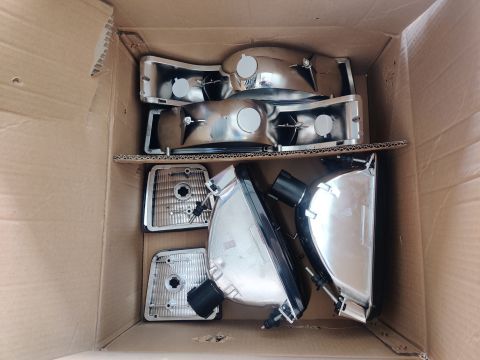 1996 Ford Bronco - 20200901 - New smoked headlight sets including headlight, corner light, and lower signal light.