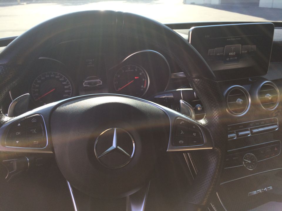 Mercedes-Benz steering wheel, dashboard, and infotainment screen