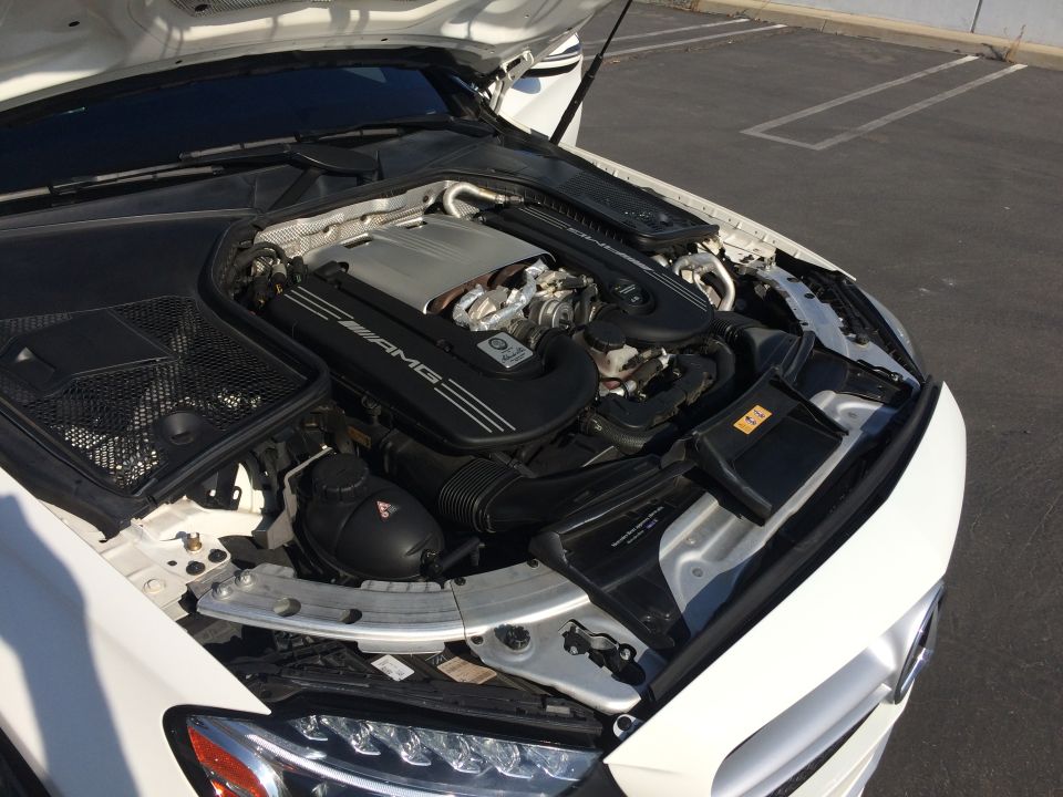 2017 Mercedes-Benz C-Class engine bay with AMG engine cover and intake