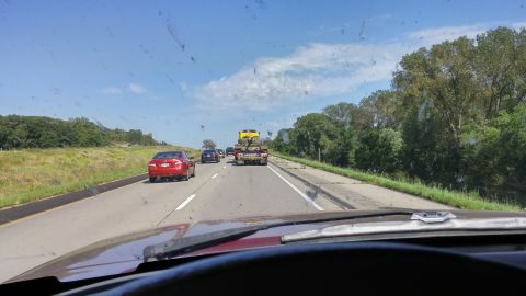1996 Ford Bronco - Driving on a sunny day with traffic on the highway.