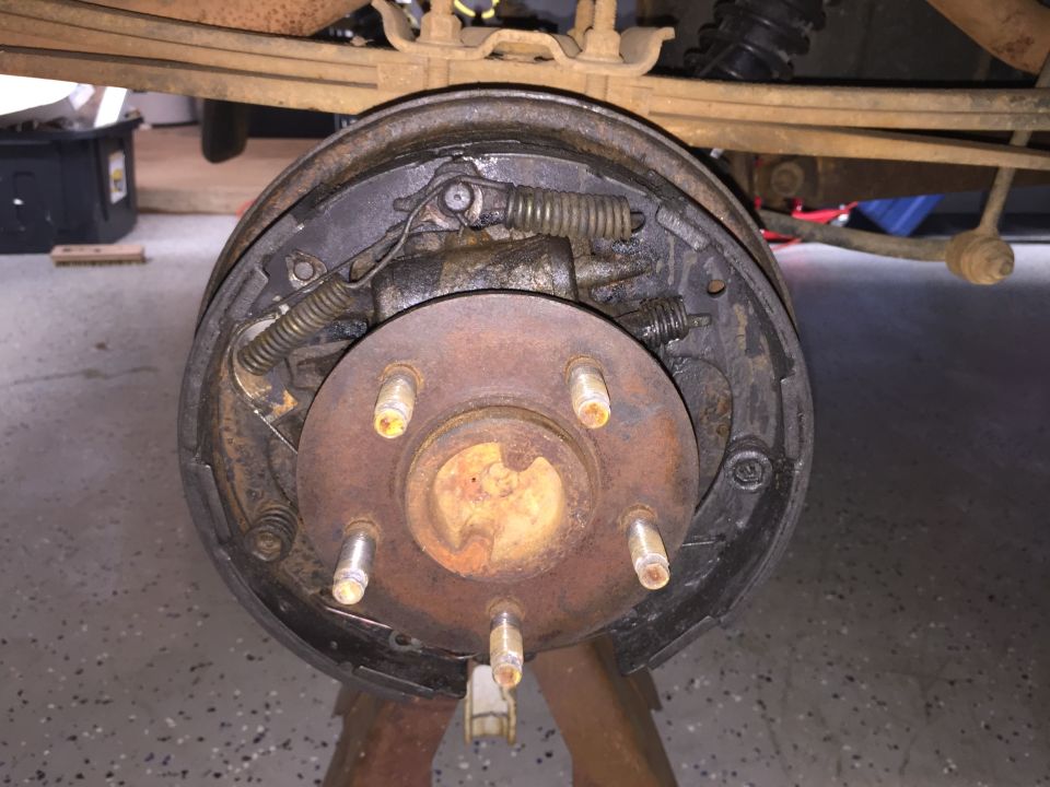 Rear drum brake assembly on jack stands