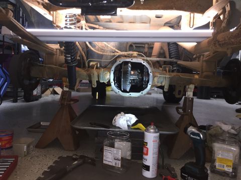 1998 Ford Ranger - The rear axle differential is exposed for service, with tools and a spray can nearby.
