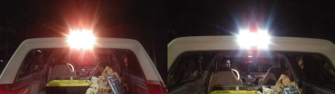 1996 Ford Bronco - Bright lights are on inside the rear of a vehicle, illuminating the cargo and seats.