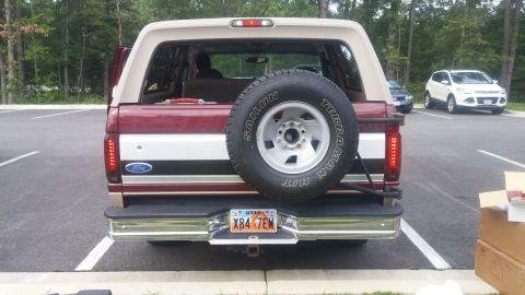 1996 Ford Bronco - Rear view of a 1996 Ford Bronco showing its spare tire and Utah license plate.