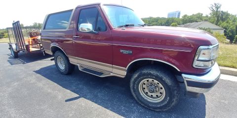1996 Ford Bronco - This 1996 Ford Bronco features a two-tone paint scheme and is equipped with a trailer hitch.