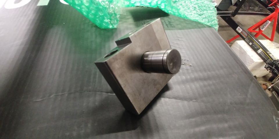 metal block with cylindrical protrusion