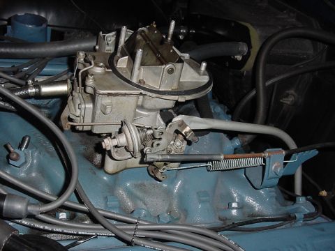 1969 Mercury Marquis - intake manifold showing plugged vacuum ports. (on the left between the wires)