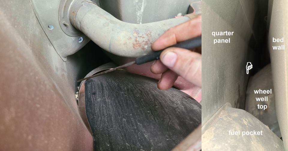 Close-up of vehicle underbody showing exhaust pipe and wheel well area. A hand is using a tool on a seam