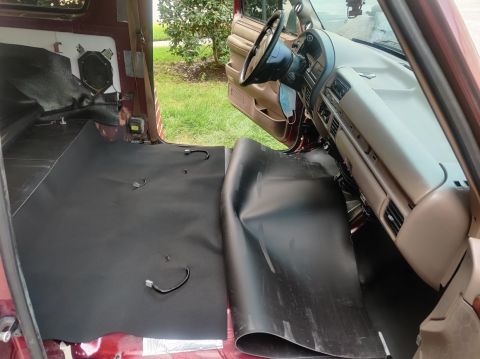 1996 Ford Bronco - Installing sound and heat insulation on the floor of a 1996 Ford Bronco.
