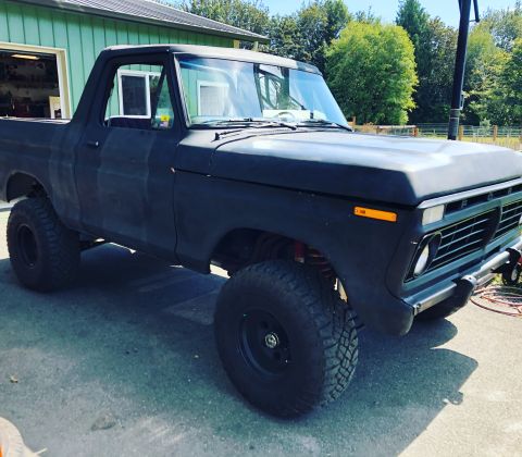 1978 Ford Bronco - This lifted 1978 Ford Bronco is presented in a matte black finish, its off-road capabilities.