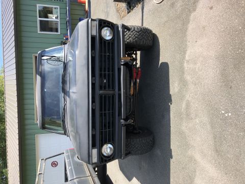 1978 Ford Bronco - Front view of a 1978 Ford Bronco, showing its grille and headlights.