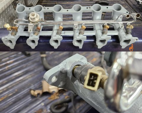 1995 Ford F-150 - After washing & sandblasting, I had a machinist weld the tab back onto the intake, then plane it & the exhaust manifolds. Then I painted it…