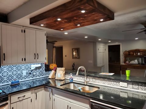 1980 Yugo Vega - Interior view of a remodeled kitchen granite countertops and custom cabinetry.
