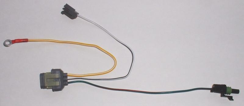 Wiring harness with ring terminal and black connector
