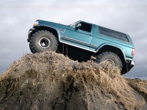 1996 Ford Bronco - This 1996 Ford Bronco is shown navigating a steep dirt embankment.