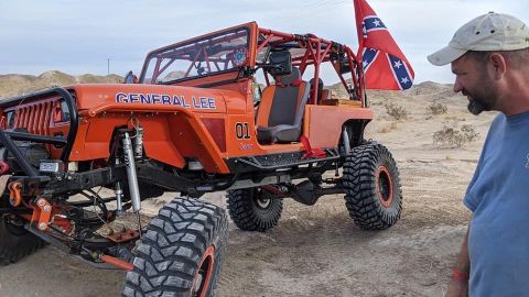 1992 Jeep Wrangler - Modified Jeep, painted orange and labeled "GENERAL LEE", flies a Confederate flag and is equipped for off-road use.