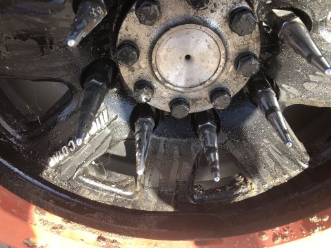 1992 Jeep Wrangler - Wheel features spiked lug nuts and text indicating 'OFF TIRE USE ONLY'.