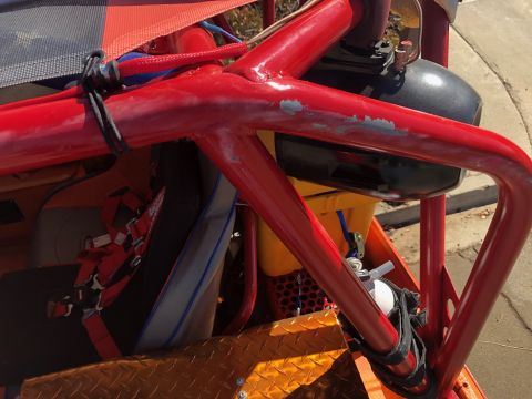 1992 Jeep Wrangler - Interior view of an off-road vehicle's roll cage and racing seat.