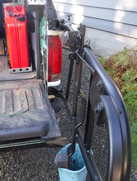1992 Ford Bronco - Locked open position. It can swing a bit wider still (beyond the body line, if putting something full width in the truck) with the extensio…