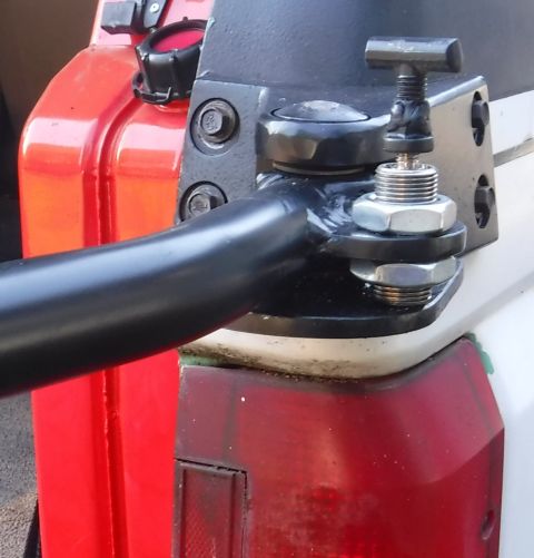 1992 Ford Bronco - Close-up of the locked open position, spring pin fully seated.