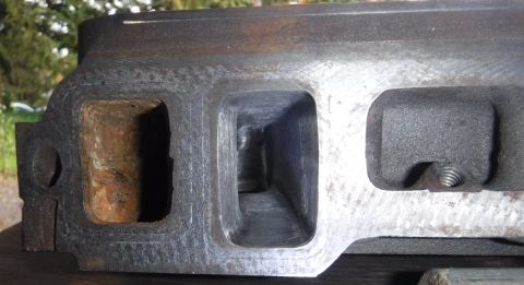 1992 Ford Bronco - Close-up of one of the intake ports. You can see the walls aren't perfectly flat, but I didn't want to take off too much material in trying…