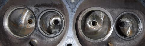 1992 Ford Bronco - Valves lapped ... plus a little flash rust from the water leak test. They all seem to seal well enough at this point.