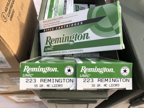 1995 Mercury Grand Marquis - Several boxes of Remington UMC 223 Remington 55 GR. MC L223R3 cartridges are visible.