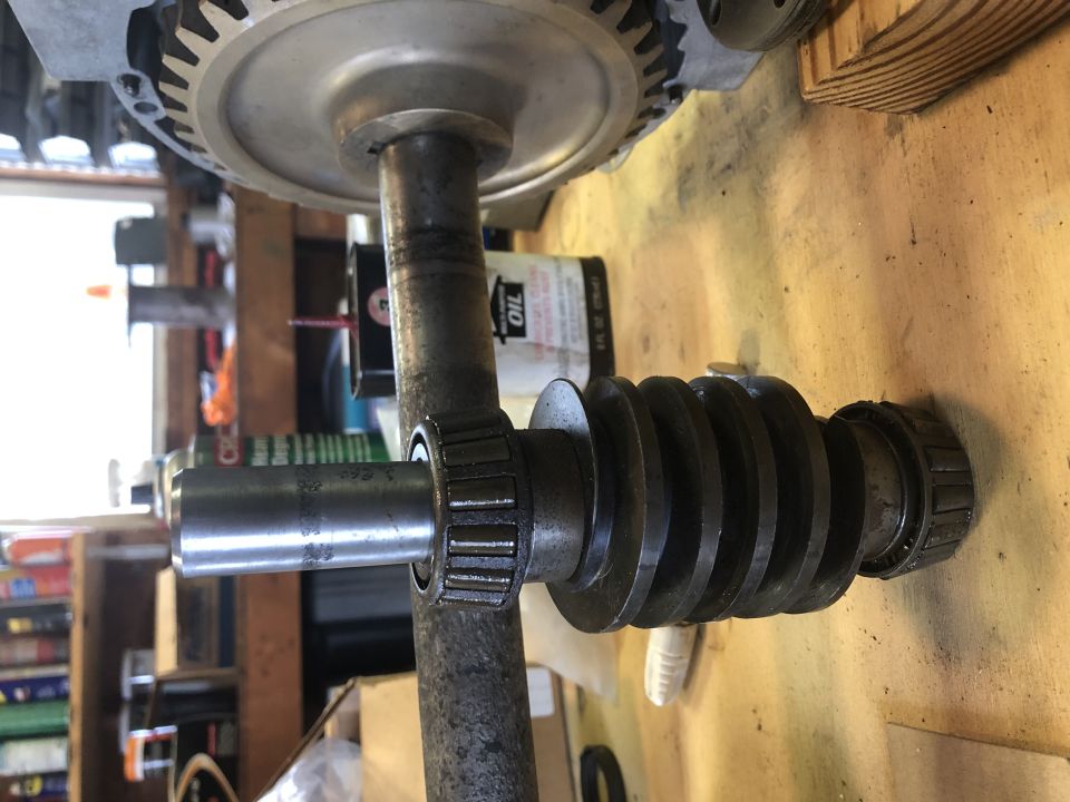 Worm gear and shaft assembly with bearings and a large cogwheel