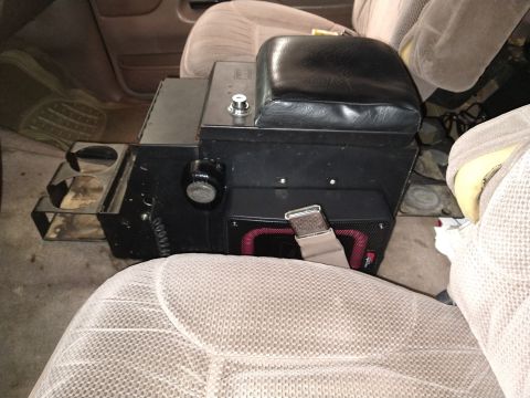 1996 Ford Bronco - Custom center console installed in a vehicle, an amplifier and cup holders.